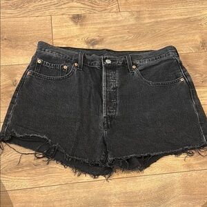 Levi's Black Jean Shorts with Raw Edges and Distressed Style 501